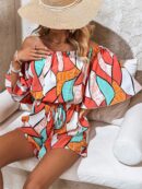 Mono de verano con estampado tropical y manga acampanada