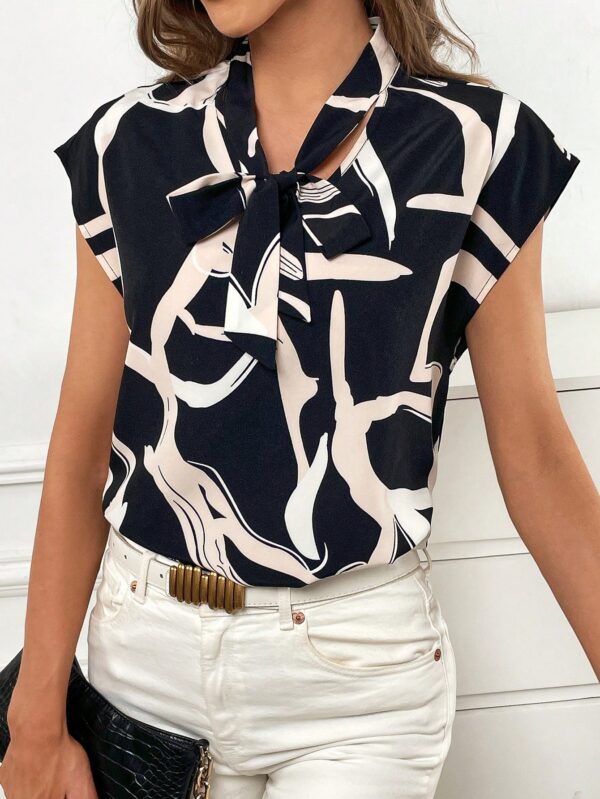 Blusa elegante con lazo al cuello y mangas murciélago - Image 10