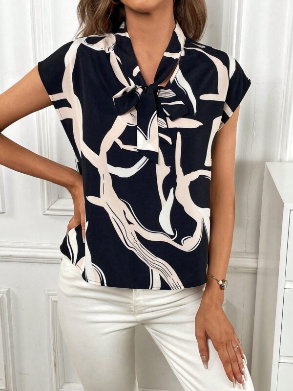 Blusa elegante con lazo al cuello y mangas murciélago - Image 11