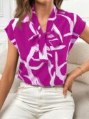 Blusa elegante con lazo al cuello y mangas murciélago